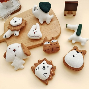 Cute handmade stuffed fabric animal brooches featuring puppy bear and elephant designs