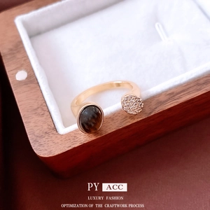 18K gold-plated tiger eye ring with pave zircons shown at a 45-degree angle