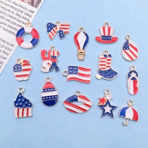 Collection of 15 USA flag themed enamel alloy charms in red white and blue patterns