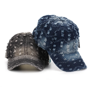 Vintage distressed denim baseball caps featuring ripped details and curved brim design