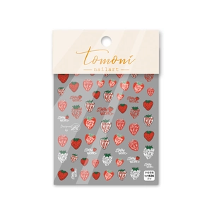 Flat lay of strawberry themed 5D nail art stickers with red fruits and green leaves