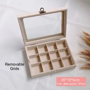 Detail showing 12-grid beige jewelry box with silver buckles and 20x15x5cm dimensions