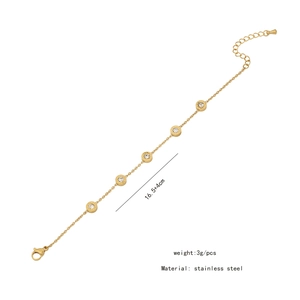 Adjustable gold stainless steel bracelet with clear gemstone pendants and size specs