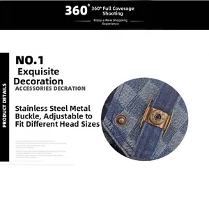Detail of adjustable bronze buckle on light blue checkered denim beret cap