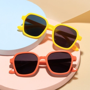 Set of two vintage square-frame kids sunglasses in yellow and orange colors