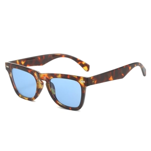 Retro tortoise frame sunglasses with light blue lenses in a classic square design