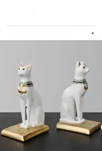 Close-up of Egyptian cat bookend detailing hieroglyphics and exotic collar on white resin