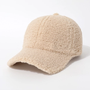 Close-up of the plush texture and warm fleece fabric on this beige baseball cap