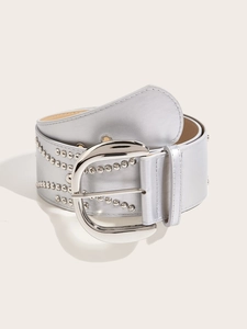 Detailed view of silver PU leather belt featuring double rows of studs and large D-ring buckle