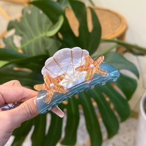 Blue acetate claw clip with seashell, starfish decorations and pearls for hair styling