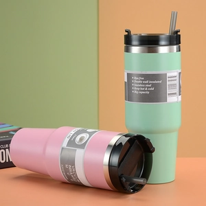 Detail of 30oz stainless steel vacuum insulated tumblers with lids and straws
