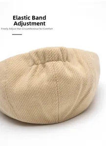 Detail view of the adjustable elastic band on a wool blend baker boy hat for custom fit