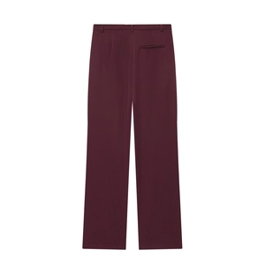 Rear view of burgundy slim-fit trousers with a smooth drape on white background