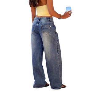 Vintage washed wide leg jeans for women featuring heart shaped back pockets in blue denim