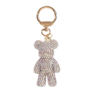 Close-up of bear keychain with colorful AB rhinestones and gold spring ring buckle