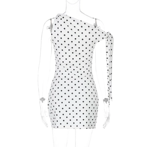 Detailed view of the one-shoulder polka dot print dress with slim fit tailoring