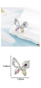 Macro detail of butterfly ear stud with micro-set zircon in pink and yellow finish
