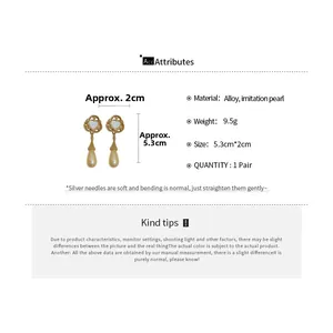 Détail de boucles d'oreilles cœur en perles avec dimensions et informations de poids