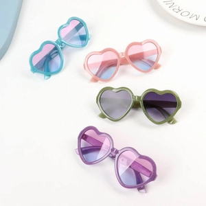 Kids heart-shaped sunglasses with glitter jelly frames and gradient lenses in four colors