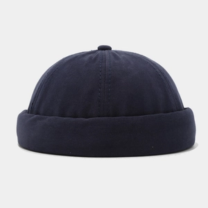 Detailed view of the navy blue cotton brimless cap with premium stitched texture