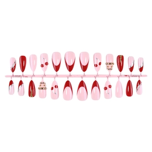 Luxury almond press-on nails set with red cherry art and silver line accents