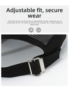 Detail of adjustable black mesh cap with silver metal buckle and breathable texture