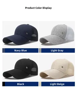 Detail view of breathable mesh baseball caps in navy blue, light gray, black, and beige