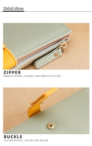 Close-up of litchi grain PU leather wallet with smooth metal zipper and buckle details