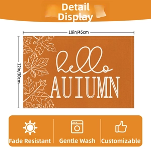 Close-up of 18x12 inch autumn pumpkin placemat with hello autumn print and maple leaves