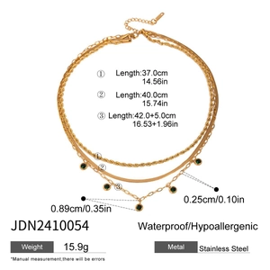 Three-layer gold stainless steel necklace with rope, snake chain and green pendant charm