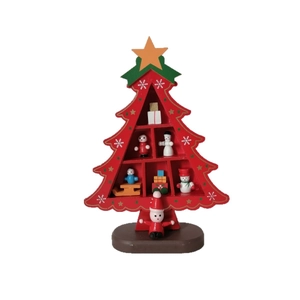 Miniature wooden Christmas tree desktop display with hand-painted figurines on white background