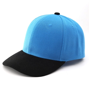 Close-up of a two-tone baseball cap featuring a blue crown and black brim in cotton twill
