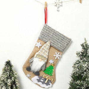 Festive burlap 3D gnome Christmas stocking for gifts and candy hanging decoration