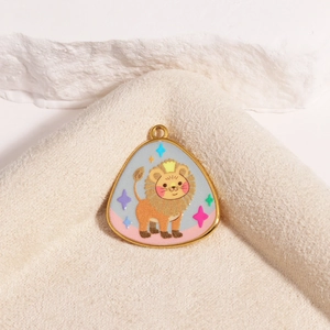Detailed close-up of a golden titanium steel oval pendant featuring a crowned lion design
