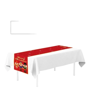 Christmas table runner with Nutcracker soldiers and Merry Christmas text on white snow