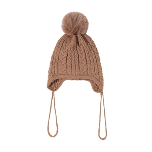 Detailed knit pattern of brown baby winter earflap hat with decorative pom pom