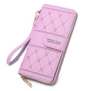 Purple long women's wallet with heart quilt pattern, zipper closure and wristlet strap
