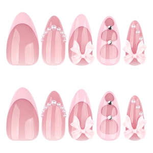 Pink French almond press-on nails with 3D bows, pearls and sparkling rhinestones