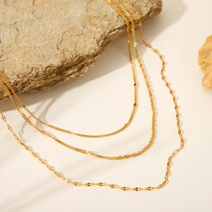 Three-layer 18K gold plated stainless steel necklace featuring flat, twisted, and tile chains