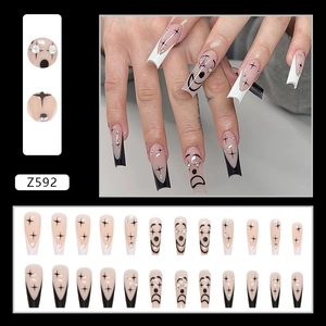 Long ballerina press-on nails with black white french smileys and star designs