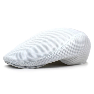 Side view of white mesh beret hat showing breathable fabric and streamlined design