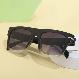Women's vintage oversized square sunglasses with black gradient frames and metal accents