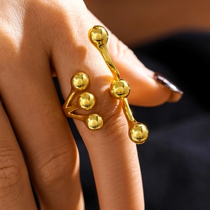 Polished 18K gold-plated molecular ring with spherical design and artistic structure