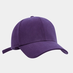 Detail of pinstripe corduroy texture on a deep purple adjustable baseball cap