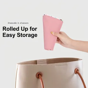Pink foldable sun hat for women with wide brim, easily rolled up into a handbag