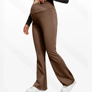 Detail of high waisted crossover V-shape maternity flare pants in brown soft fabric