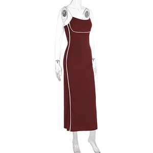 Detail of burgundy bodycon dress featuring white contrast piping and slim spaghetti straps