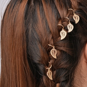Golden hollow leaf hair charms for DIY braids on model back view in close-up