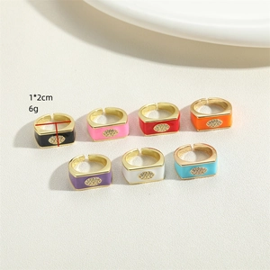 Set of 7 colorful enamel rings with evil eye crystal design and open adjustable band