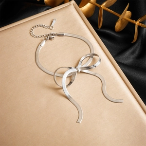 Silver bow knot snake chain bracelet with adjustable link and lobster clasp closure